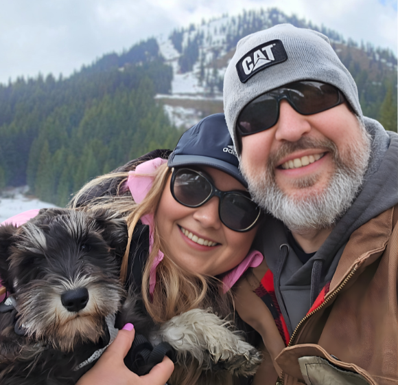 Olena with her husband and Gunny in the mountains